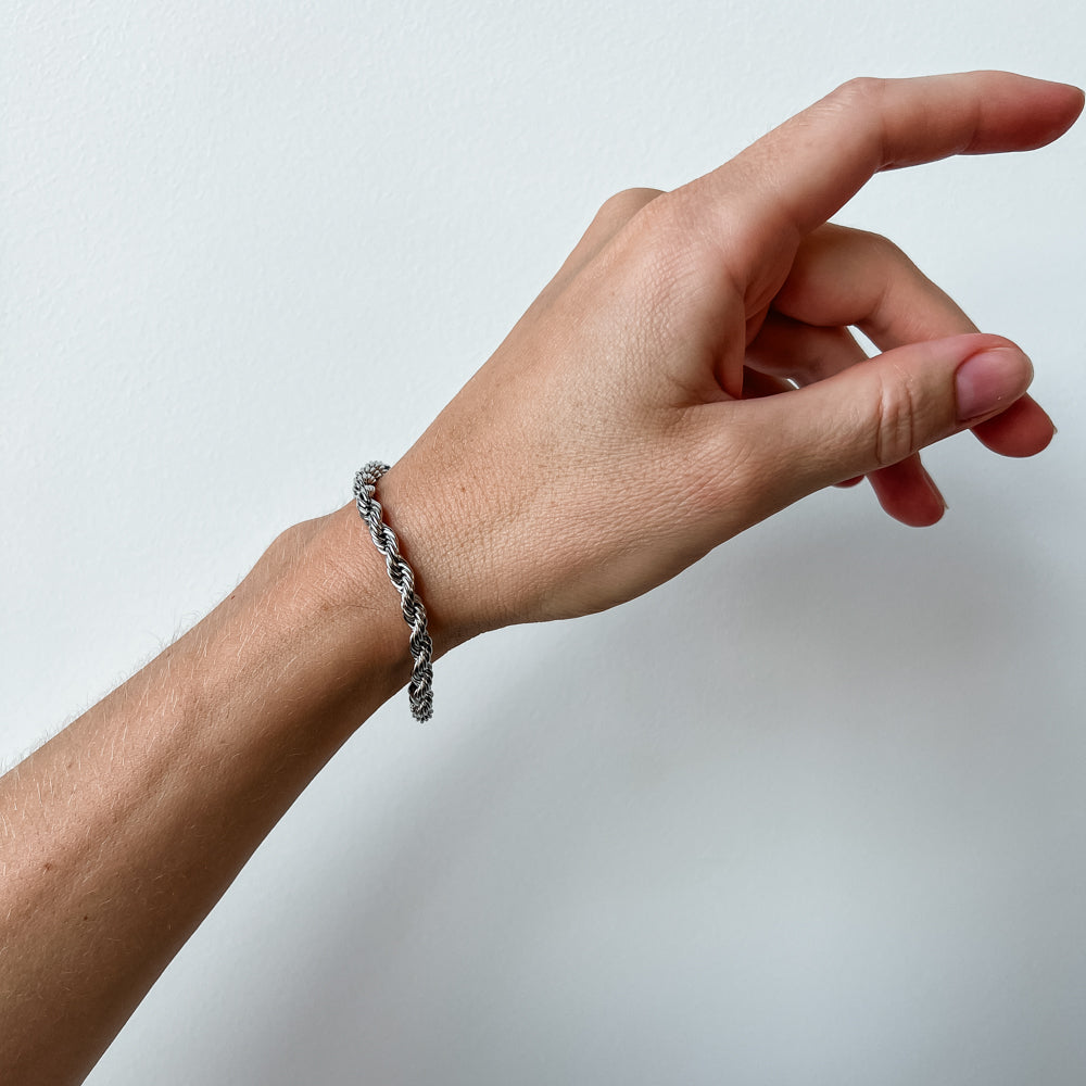 Twisted silver colour bracelet