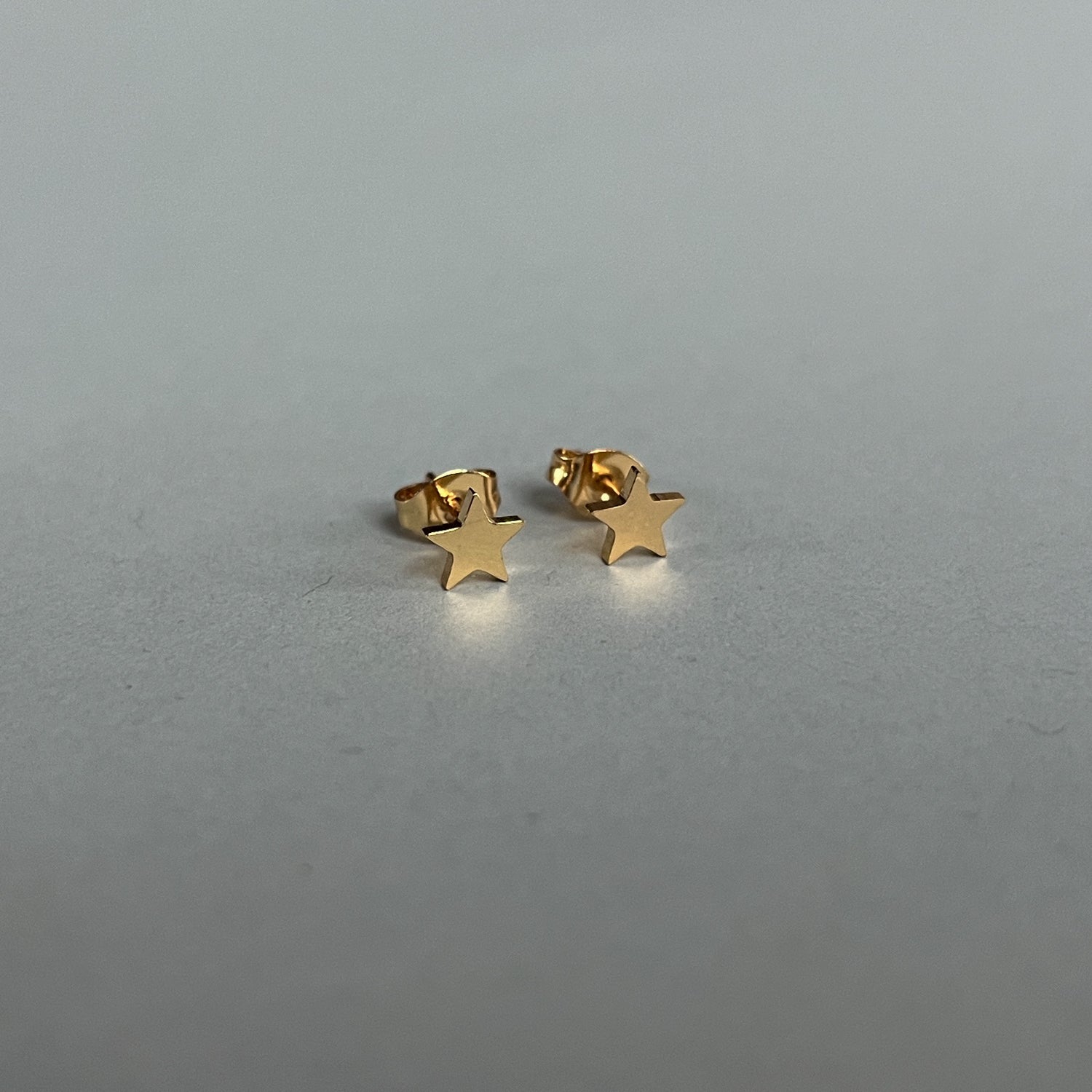 Gold colour tiny star stud earrings