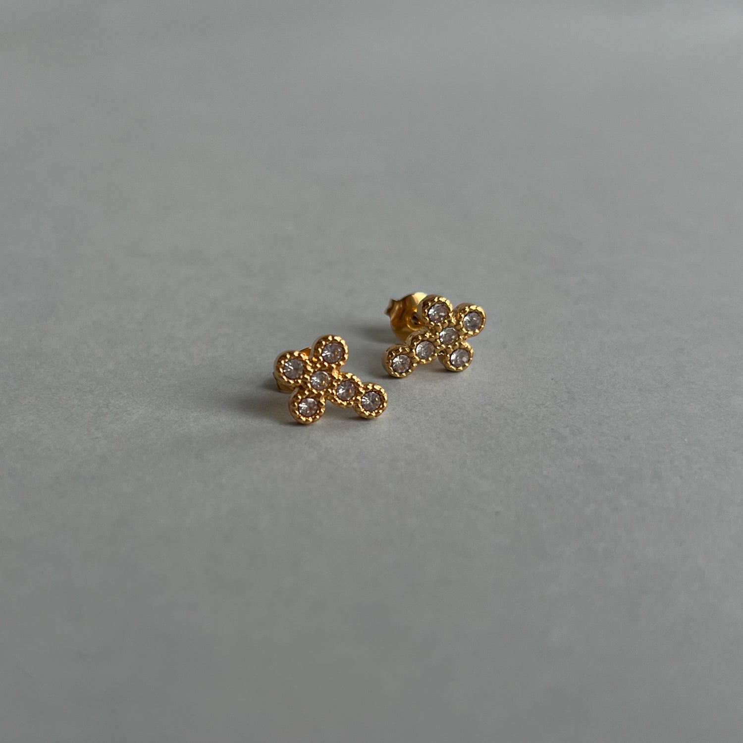 Gold colour cross studs with zircons