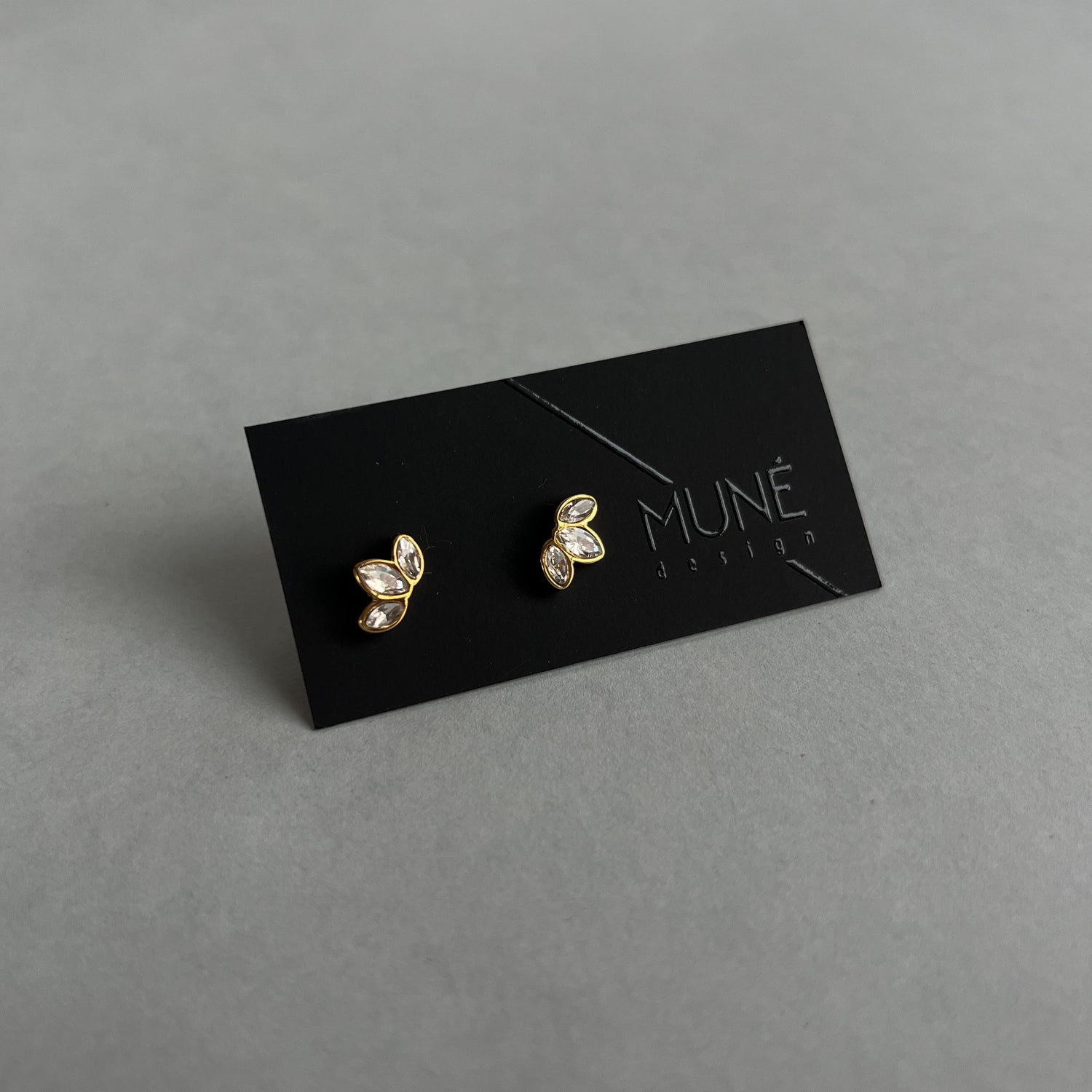 Gold colour small studs with zircons