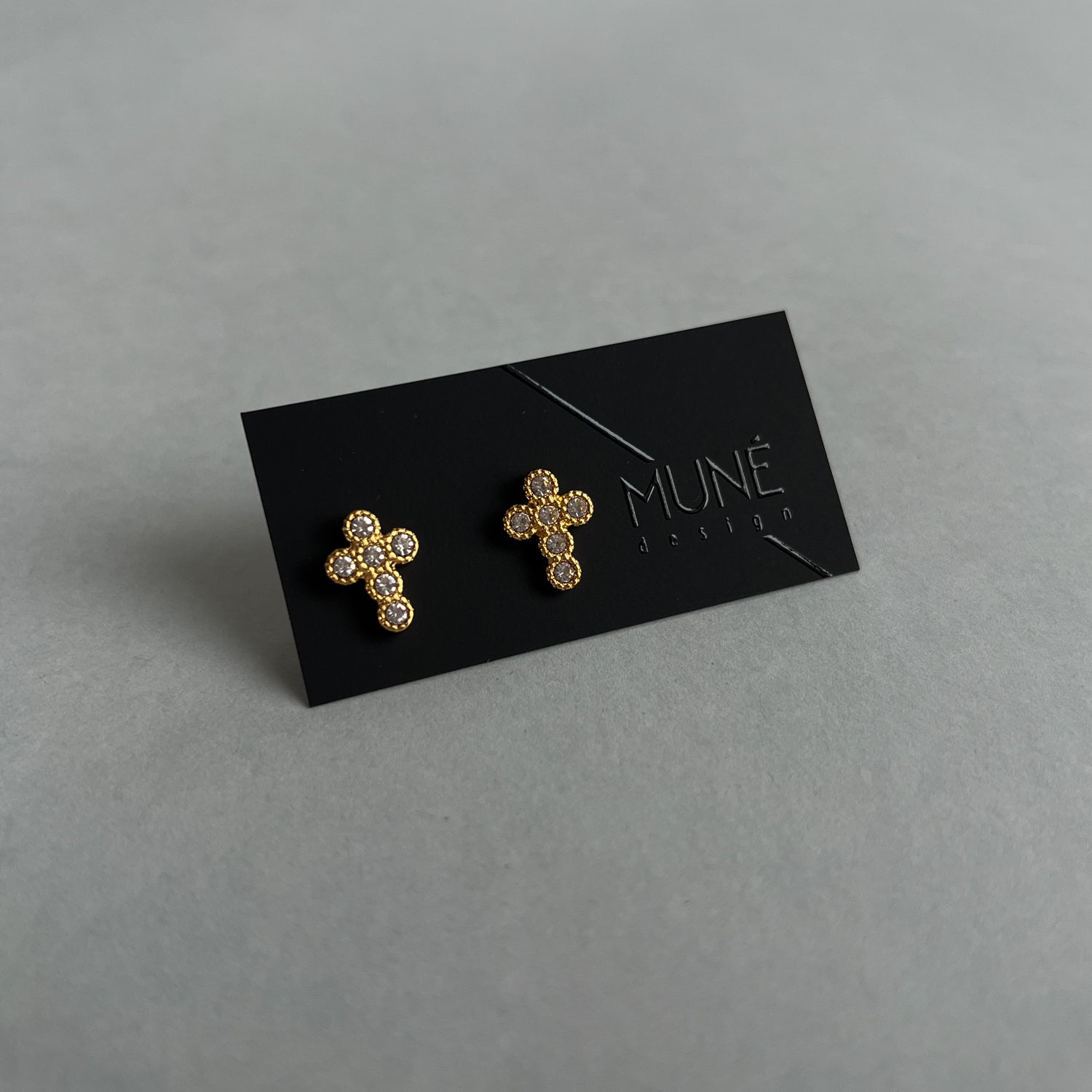 Gold colour cross studs with zircons