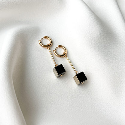 Gold plated hoop earrings with hematite